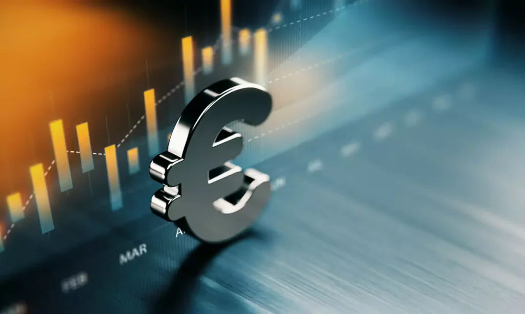 Symbole euro métallique devant un graphique financier, illustrant la fiscalité d’une rente issue d’un PER